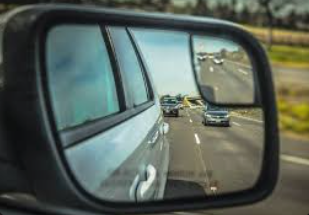 You can see in the side-view mirror the overtaken car